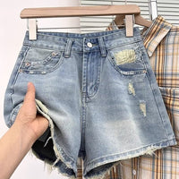 Plus-size High-waisted Ripped Denim Shorts For Women