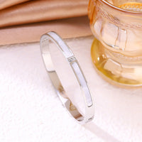 Stainless Steel Bracelet Inlaid With Three White Shell Gemstones
