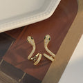 Sleek Serpentine Ear Bone Clip With A Sophisticated High-end Vibe