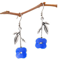 Elegant Deep-blue Stud Earrings With Delicate Floral Accents