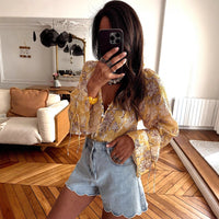 Vacation-ready V-neck Flared-sleeve Printed Loose-fit Blouse