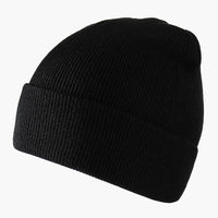 The new knitted woolen hat is thick and warm in solid color