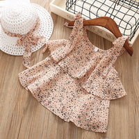 Two-piece suit of sling floral top and shorts