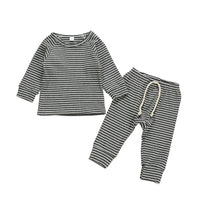 Two piece children's suit with striped top and trousers