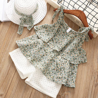 Two-piece suit of sling floral top and shorts