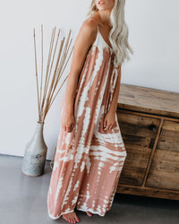 Loose sling tapered printed jumpsuit