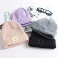 Smiley lady in knitted hat