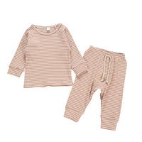 Two piece children's suit with striped top and trousers