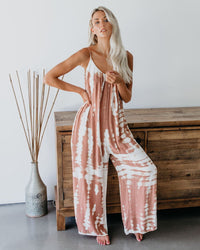 Loose sling tapered printed jumpsuit