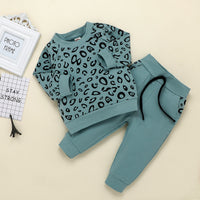 Leopard print top and sweatshirt solid color trousers