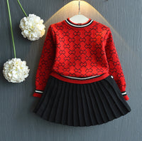 Two piece sweater and skirt suit