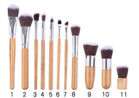 11 bamboo handles, makeup brush, tool set, linen bag, blush brush, foundation brush, and a full set of makeup.