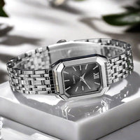 The Lady Is Just Wearing A Square Quartz Watch
