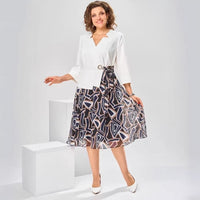 Short-sleeve V-neck Dress With A Unique Print