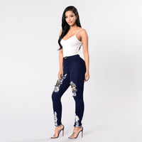 Leopard-Print Stitching Denim Slim-Fit Trousers