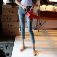 Trendy High-waisted Cropped Jeans With Raw Edges And Ripped Holes