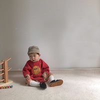 Long-sleeved Smiley Baby Bodysuit