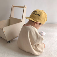 Long-sleeved Smiley Baby Bodysuit