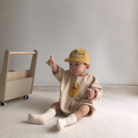 Long-sleeved Smiley Baby Bodysuit