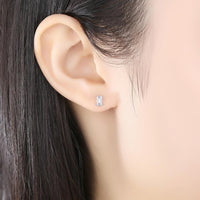 Silver-plated Rectangular Pagoda Emerald Cut Rectangular Zircon Earrings