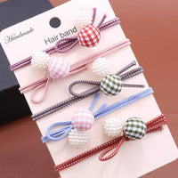 Hand-knotted gingham ball head rope