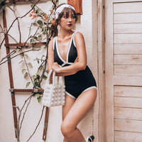 Women's one-piece black and white swimsuit