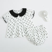 Two-piece baby girl blouse and pants
