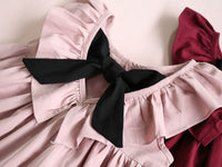 Ruffled lace bow dress