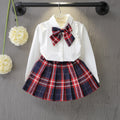 Solid Color Shirt Plus Plaid Skirt
