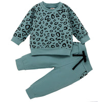 Leopard print top and sweatshirt solid color trousers