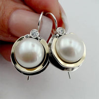 Round White Gold Inlaid Red Diamond Earrings