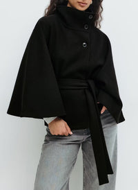 Trench Coat With A Stand-up Collar Buttons And A Belt