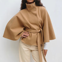 Trench Coat With A Stand-up Collar Buttons And A Belt
