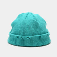 Hole knitted wool hat