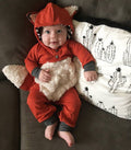 Cartoon fox in a long-sleeved onesie