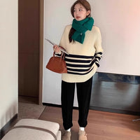 Loosefitting Midlength Knit Sweater With A Standup Collar For Pregnant Women