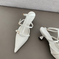 Empty Sandals Behind Women's Baotou