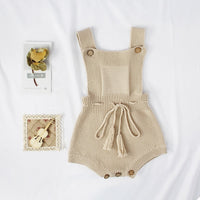 Knitted woolen jumpsuit for babies and toddlers