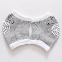 Children's dispensing anti-skid knee pads