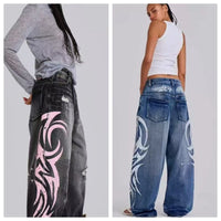 Womens Distressed Relaxed-Fit Denim Jeans With A Bold Totem Print And Extra-Wide Legs