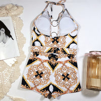 Swimsuit with printed cutout straps