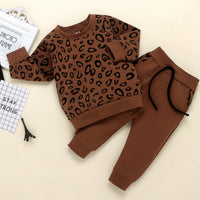 Leopard print top and sweatshirt solid color trousers