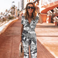 Cross V-neck belt jumpsuit