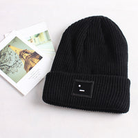 Smiley lady in knitted hat