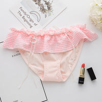 Low-rise ladies briefs with flashing ribbons