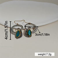 Creative Spiral-Inlaid Sapphire Earrings With Yellow Accents