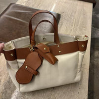 Textured Cowhide High Canvas Loose Crossbody Bag