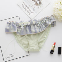 Low-rise ladies briefs with flashing ribbons