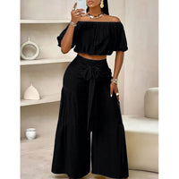 High-waisted Solid-color Flared Pants With Tie Detailing And A Flowing Drape
