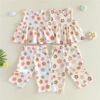 Flowy Sleeveless Top With A Full Floral Print Paired With Pocketed Pants
